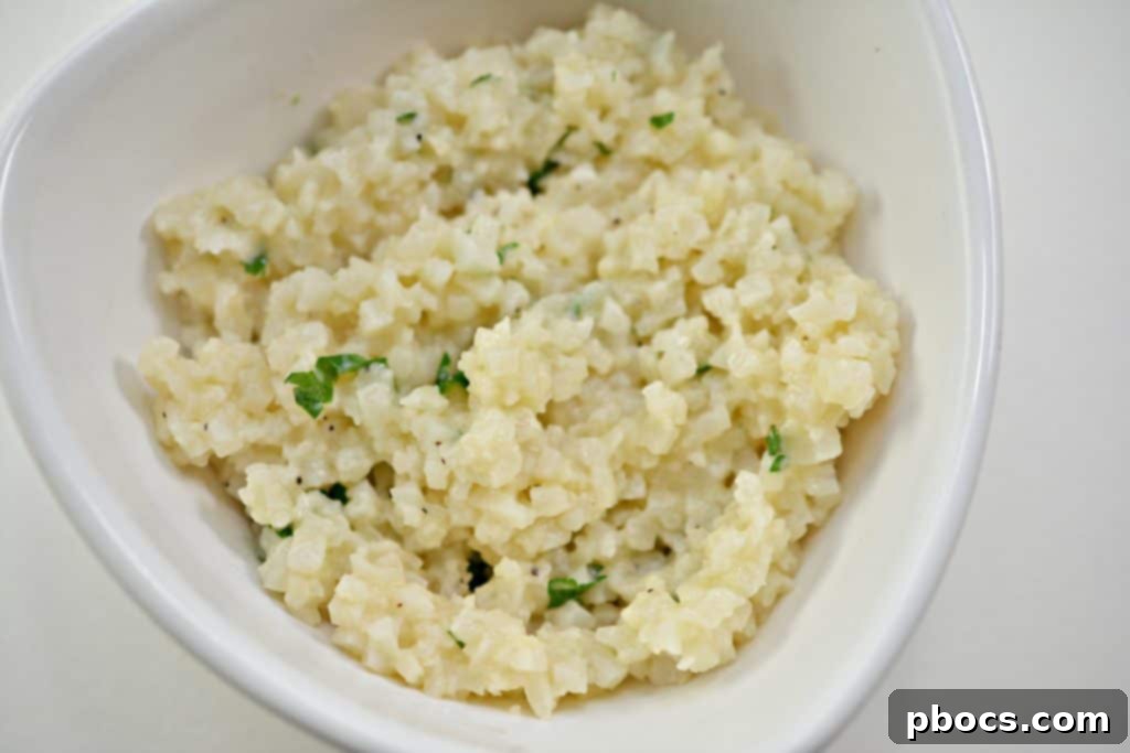 Vibrant Keto Pesto Salmon Bowl 13 Keto Pesto Salmon Bowl - Salmon fillets baking in the oven on a sheet