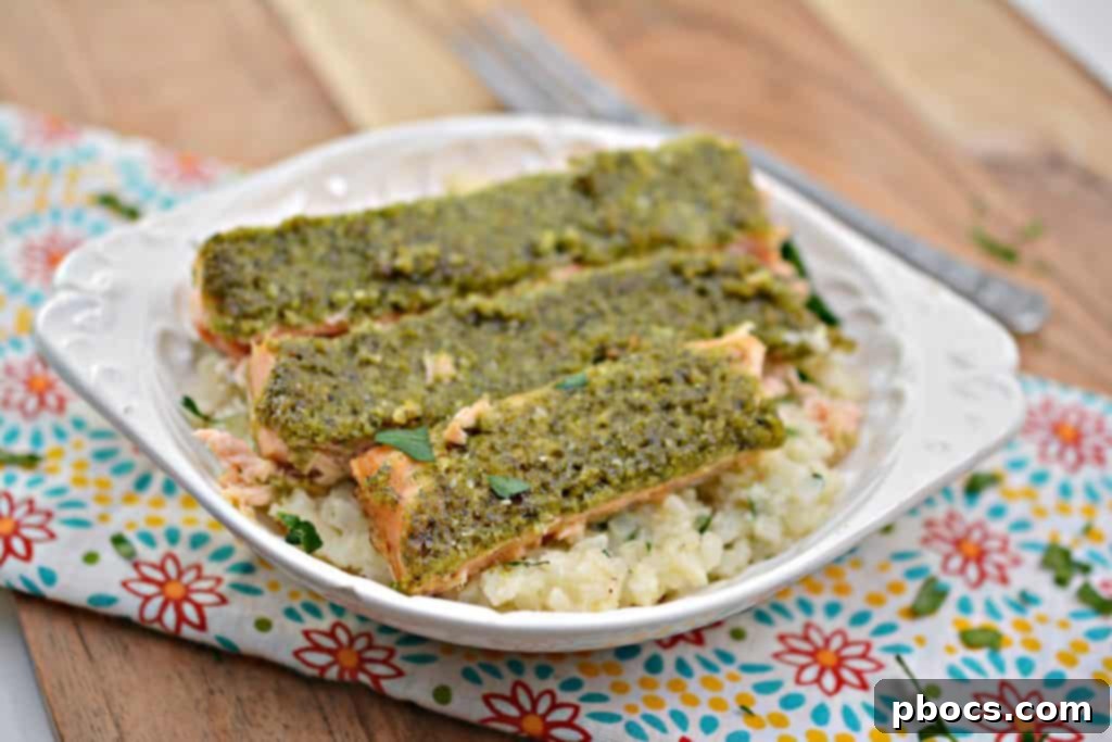 Vibrant Keto Pesto Salmon Bowl 3 Keto Pesto Salmon Bowl - Ingredients for pesto being prepared in a food processor