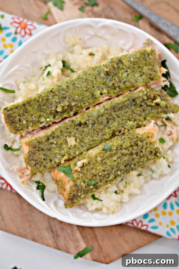 Vibrant Keto Pesto Salmon Bowl 5 Keto Pesto Salmon Bowl - Prepared cauliflower rice with butter, parmesan, and parsley ready to serve