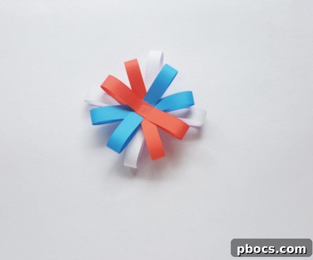 Adding more layers of paper loops to the firework