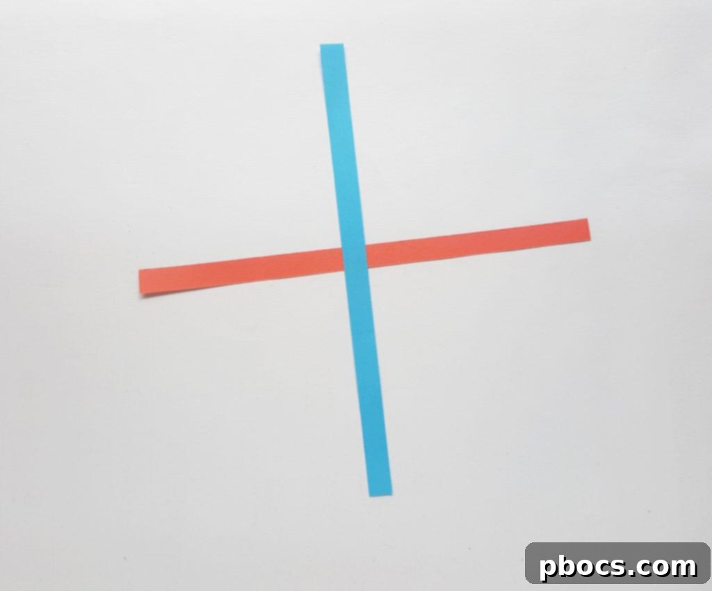 Gluing two paper strips crisscross style