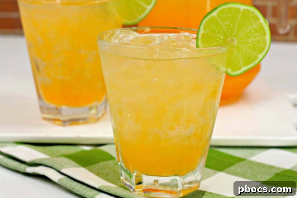 Tequila Cantaloupe Spritzer in a vintage-style glass with a straw