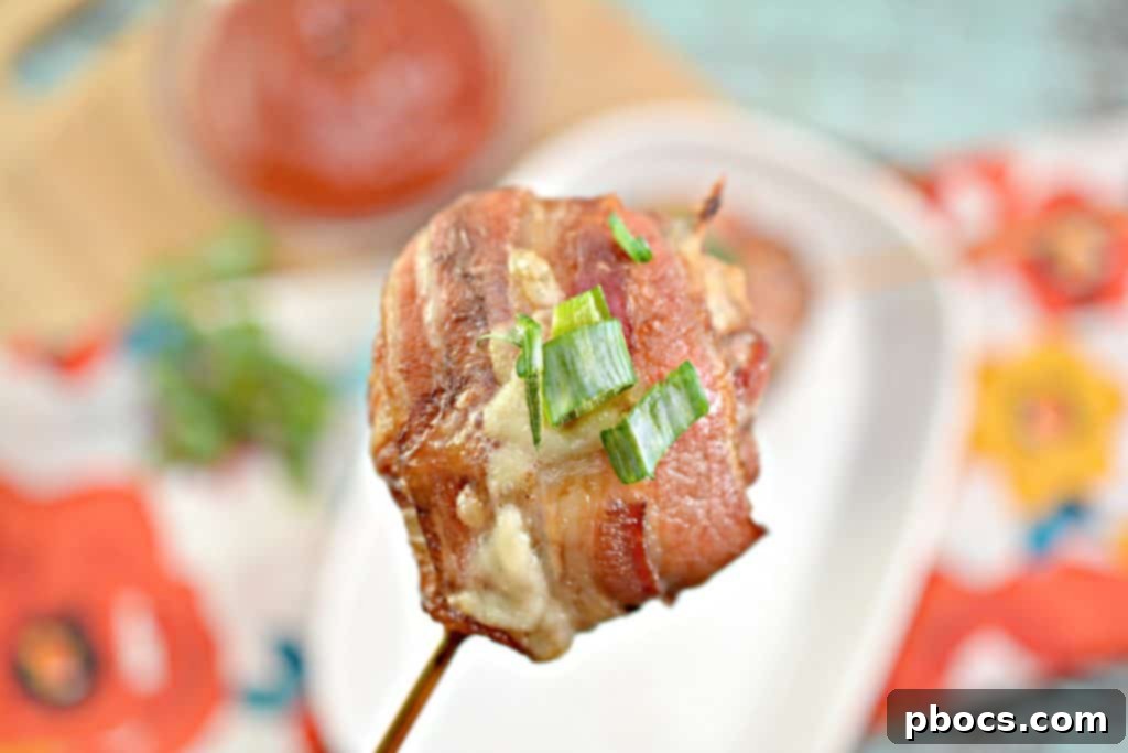 Keto Bacon Cheeseburger Pops 6 Finished Keto Bacon Wrapped Cheeseburger Lollipops presented beautifully on a wire rack