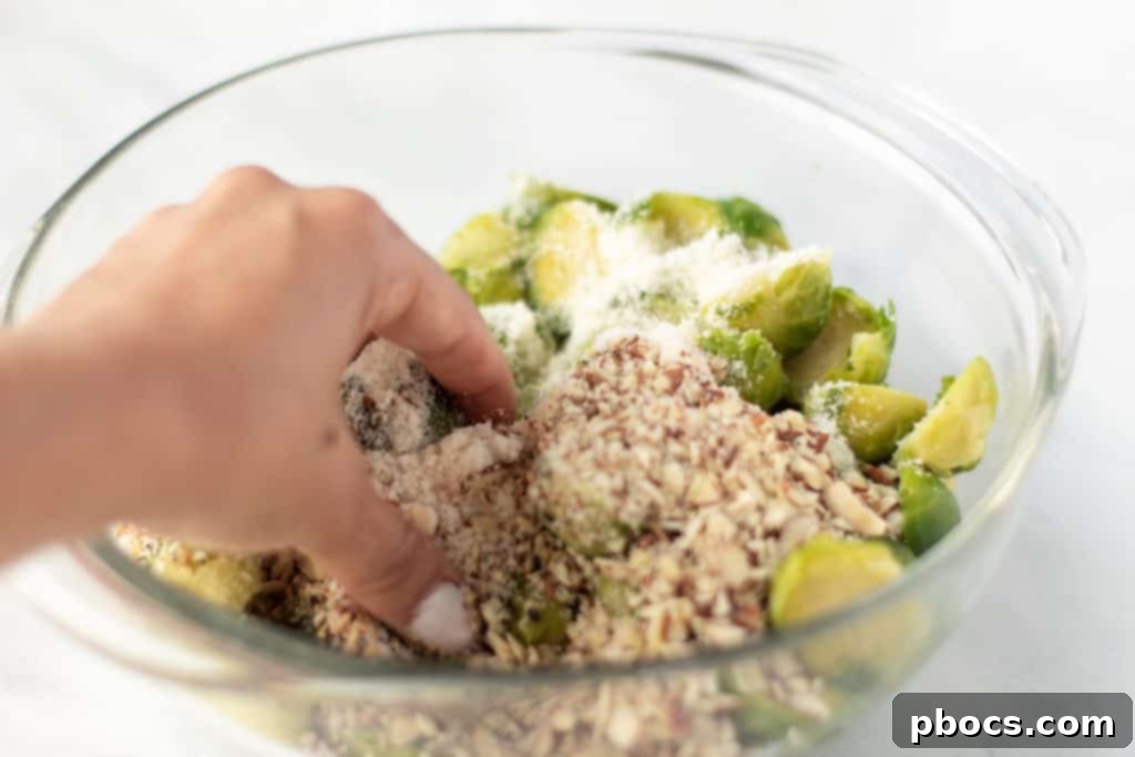 Tossing Brussels sprouts with ingredients