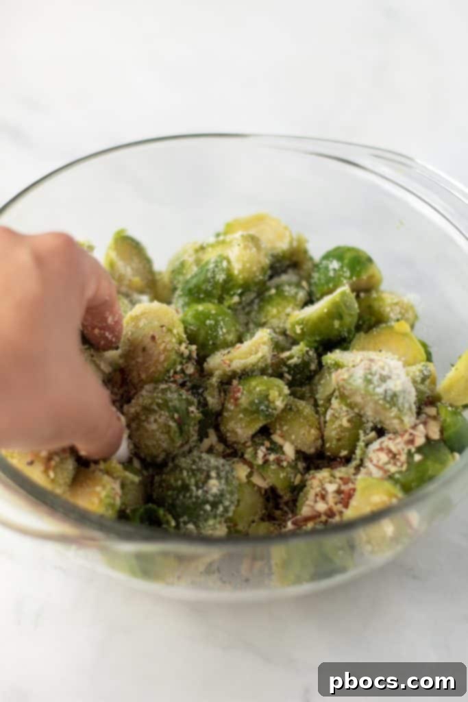 Well-coated Brussels sprouts ready for air fryer