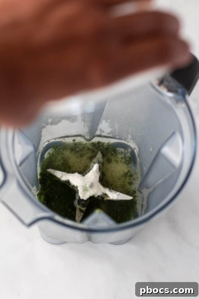 Coconut Keto Matcha Chill 8 Adding matcha powder to the blender