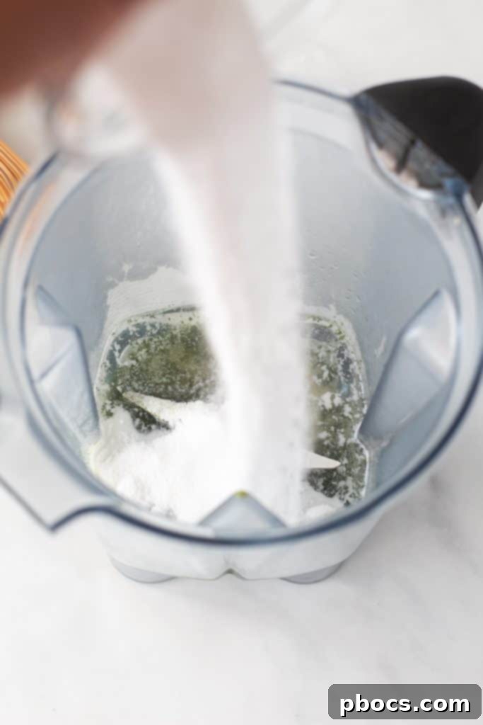 Coconut Keto Matcha Chill 9 Adding coconut milk to the blender