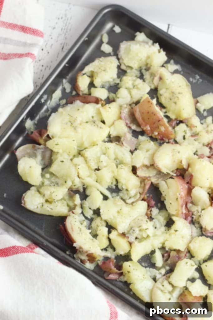 Smash Hit Bacon Cheddar Ranch Potatoes 11 Process of smashing boiled red potatoes