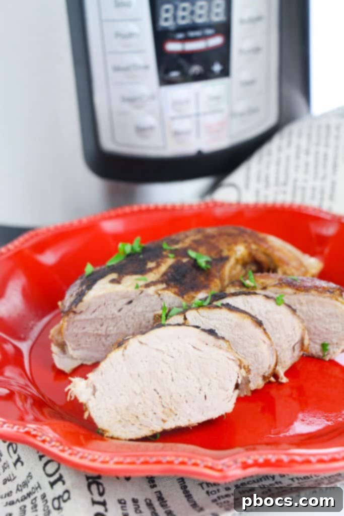 Instant Pot Low Carb Pork Tenderloin sliced and ready for serving with low-carb sides.