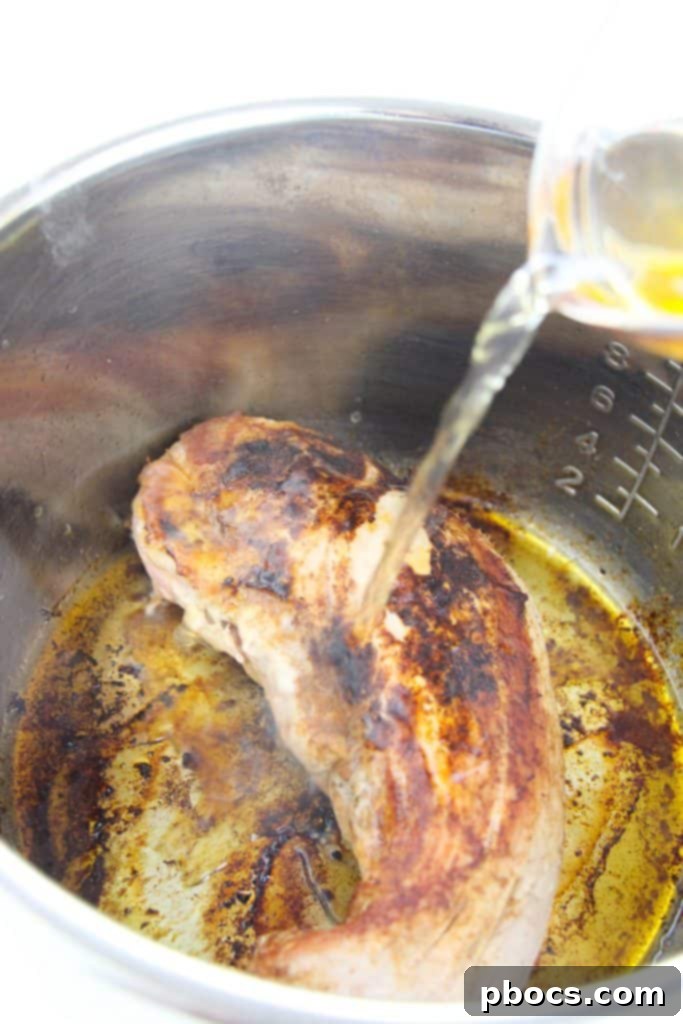 Browning the pork tenderloin in the Instant Pot