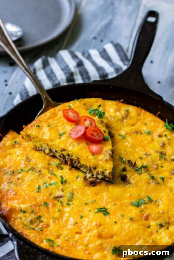 Keto Crustless Taco Casserole 12 Close-up of a serving of Low Carb Crustless Taco Pie with toppings