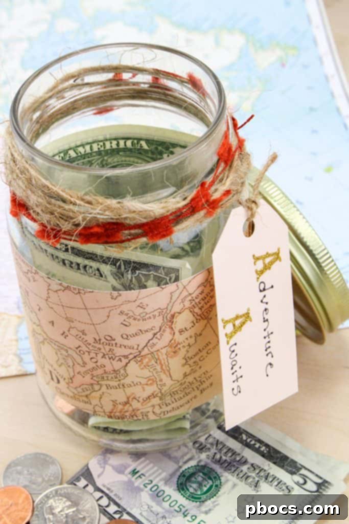 DIY Travel Fund Mason Jar Craft on a wooden table