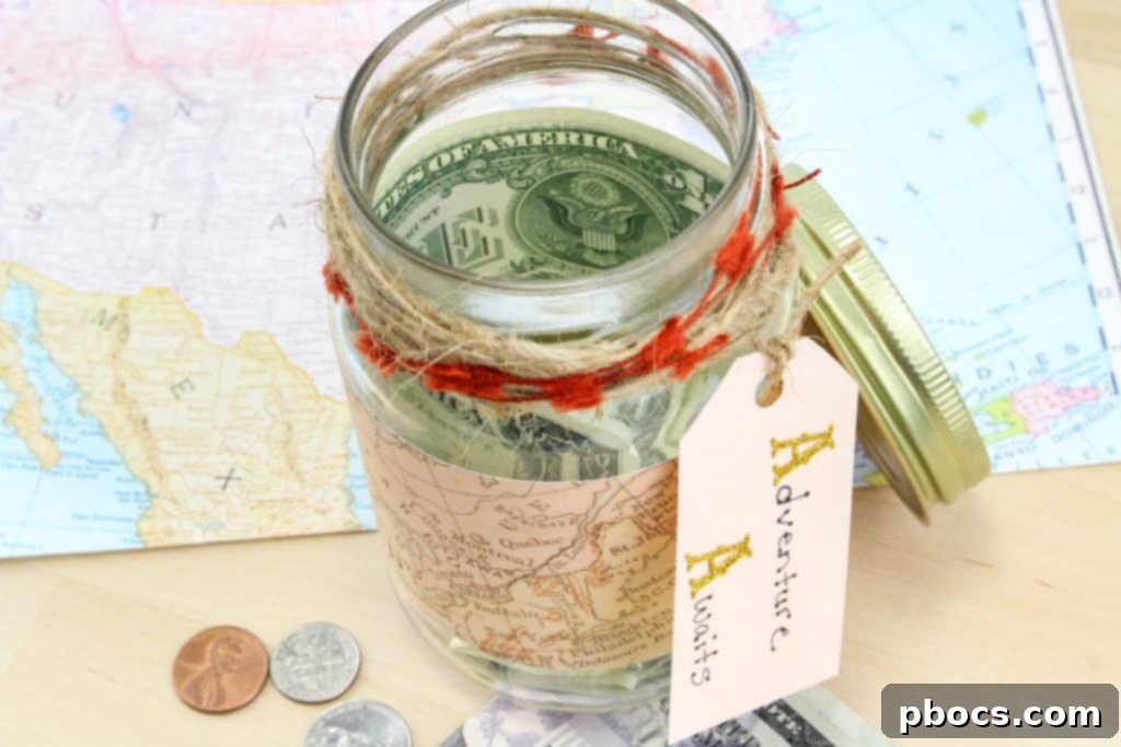 Close-up of a DIY Travel Fund Mason Jar Craft with coins inside