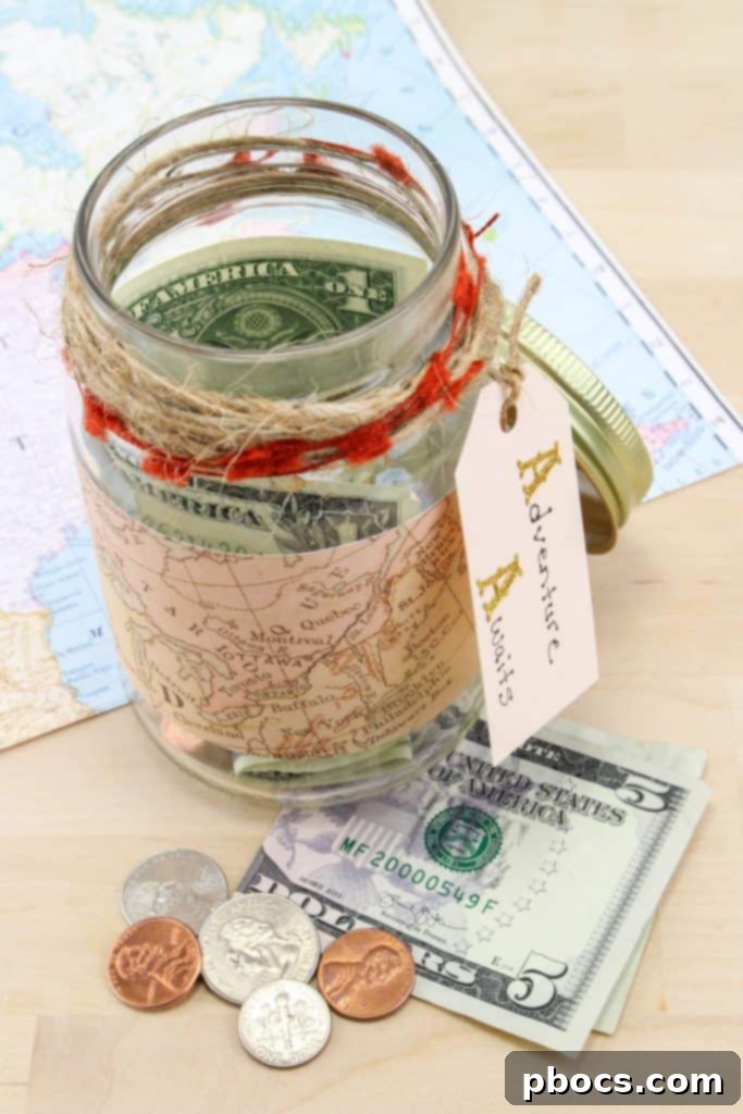 A beautifully decorated Travel Fund Mason Jar Craft