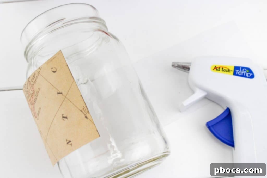 Wrapping map paper around the mason jar