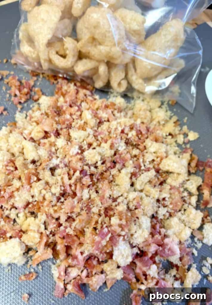 Crushed pork rinds and crispy bacon pieces for the casserole topping