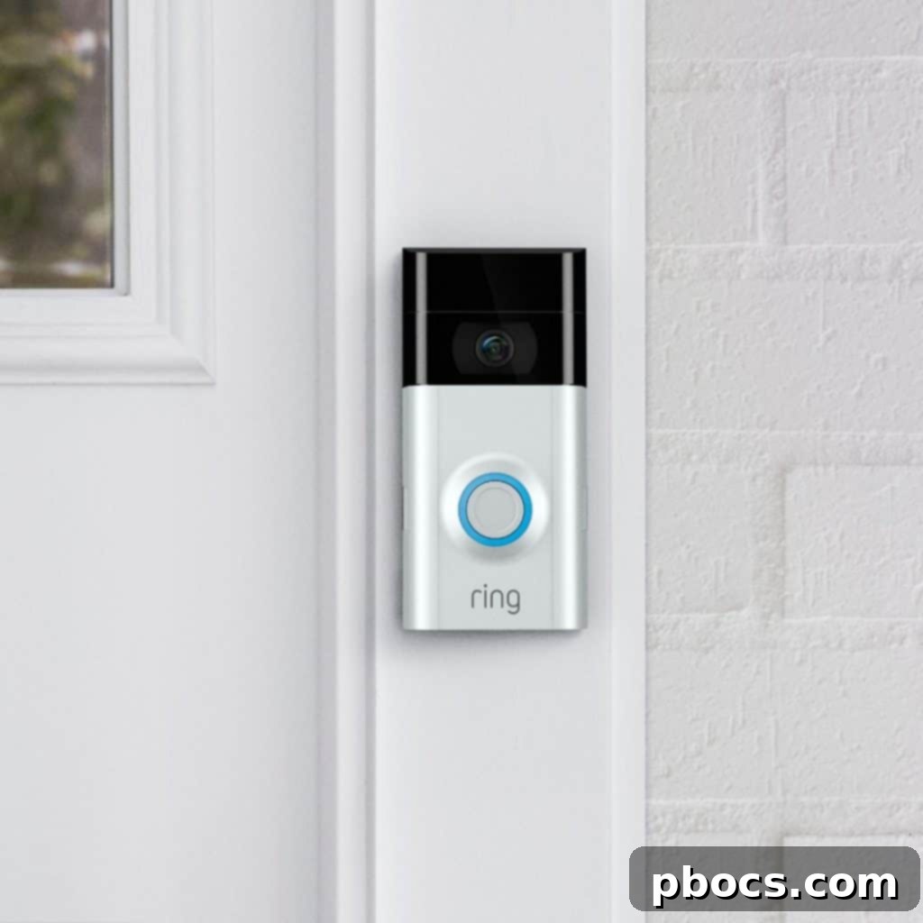 Ring Video Doorbell installed on a door, with a smartphone showing its view.