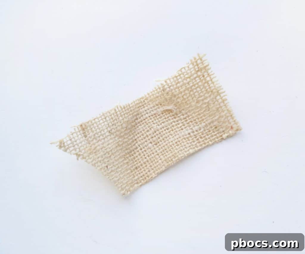 Scarecrow Craft Step 6: Cutting burlap for hat