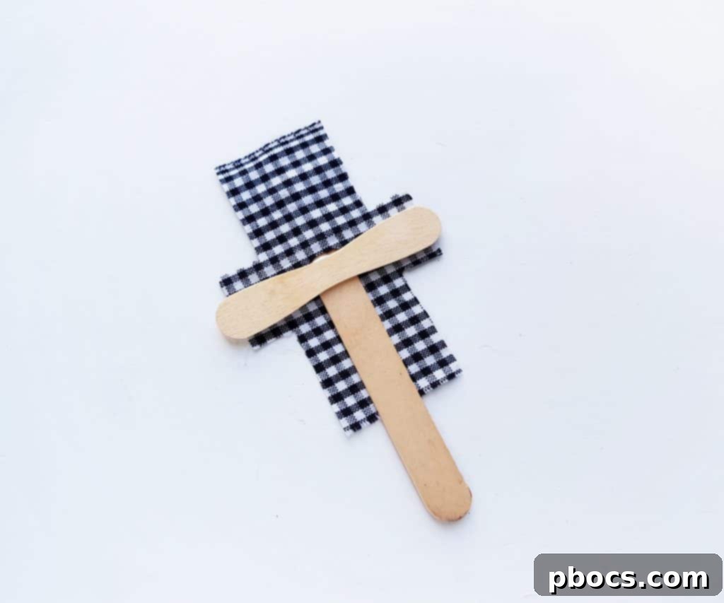 Scarecrow Craft Step 10: Putting on the shirt