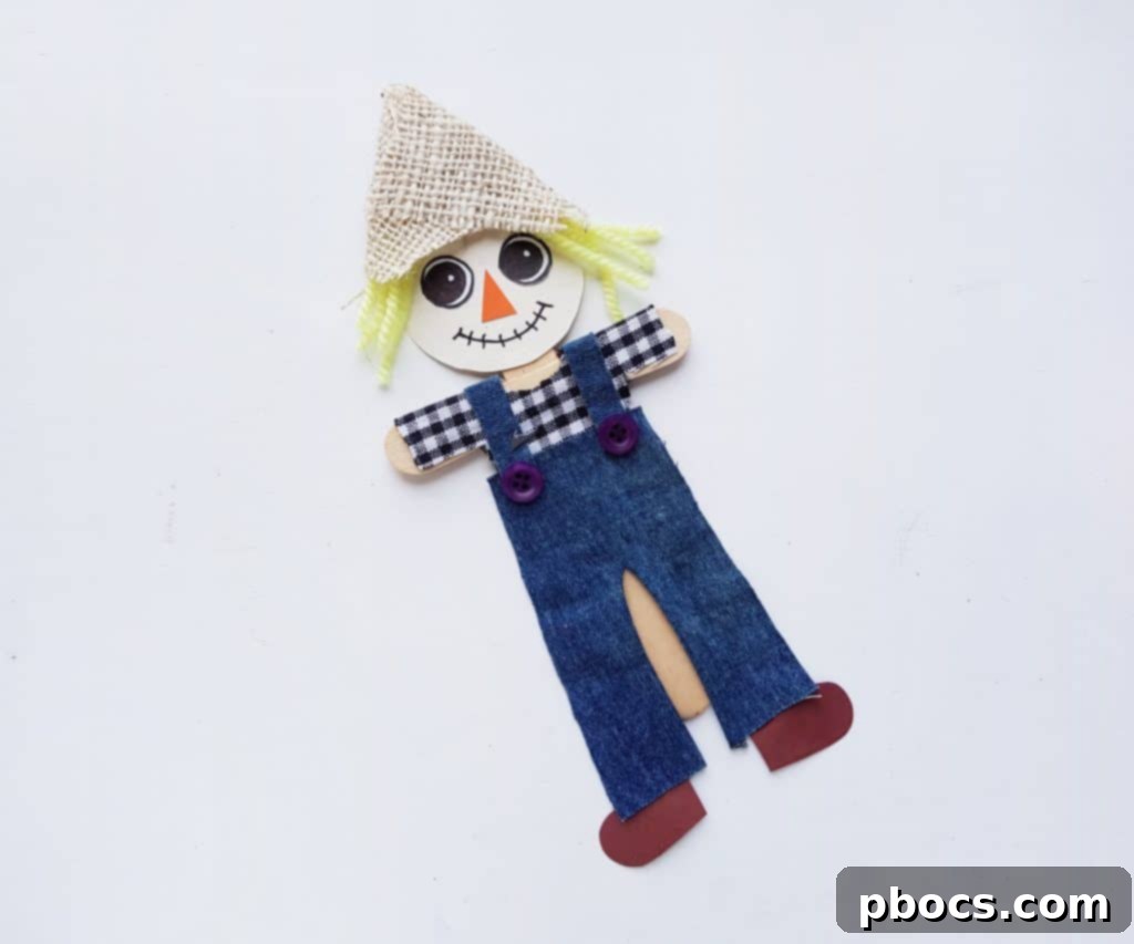 Scarecrow Craft Step 13: Attaching head and hat