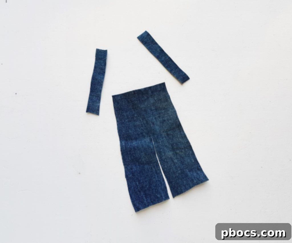 Scarecrow Craft Step 4: Cutting trousers from jeans fabric