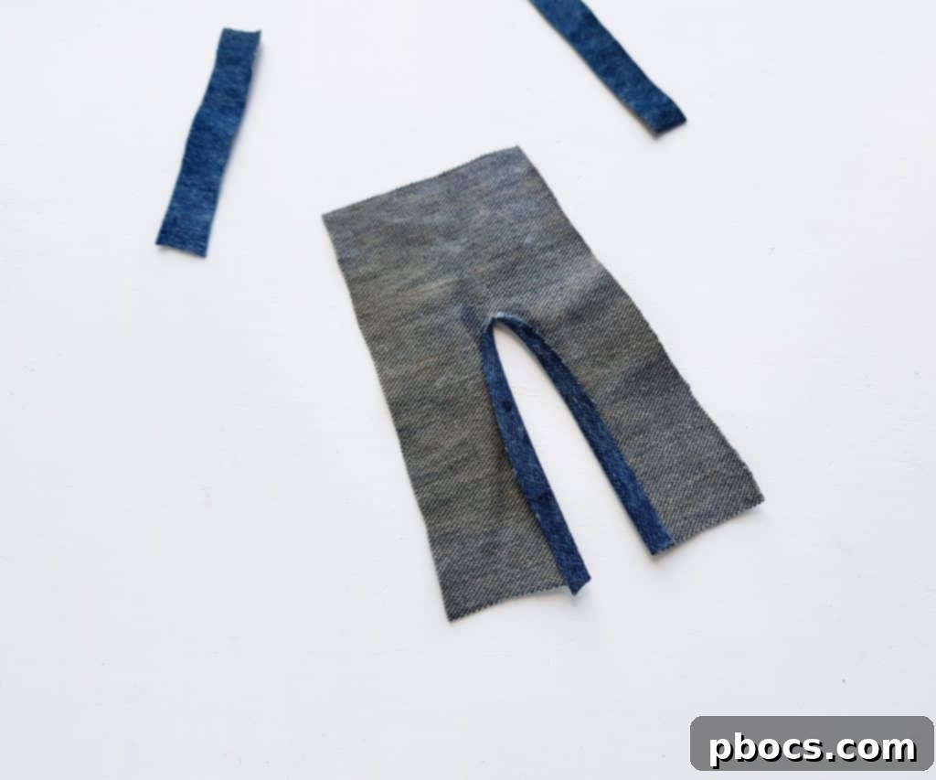 Scarecrow Craft Step 5: Folding and securing trousers slit