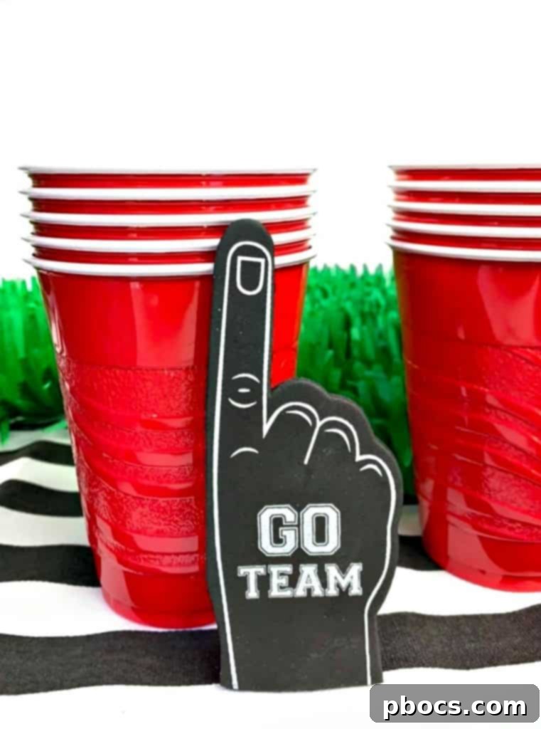 Football party decor featuring stripes for a referee theme