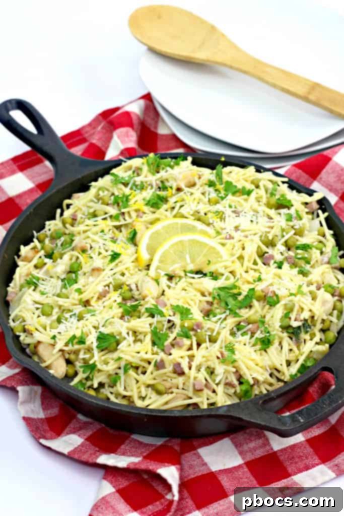 Quick Pancetta and Sweet Pea Pasta 5 Top-down shot of Easy Pancetta Pea Pasta garnished with fresh parsley and lemon