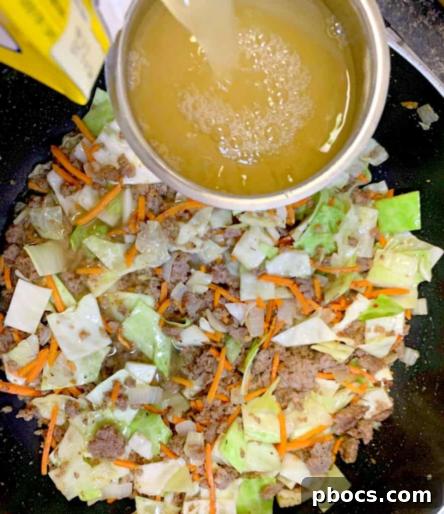 Adding broth and vegetables to the pot