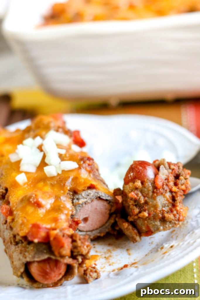A slice of Low Carb Chili Cheese Dog Bake on a plate, ready to be served.