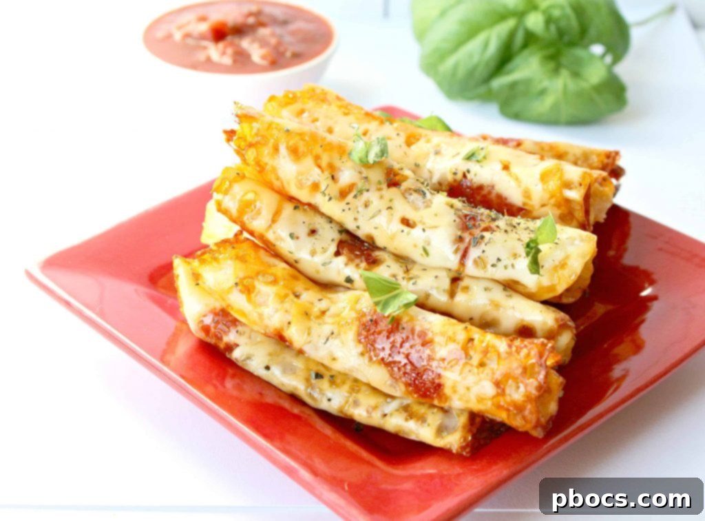 Keto Pizza Pinwheels 5 Keto Pizza Roll Ups served as an appetizer at a party