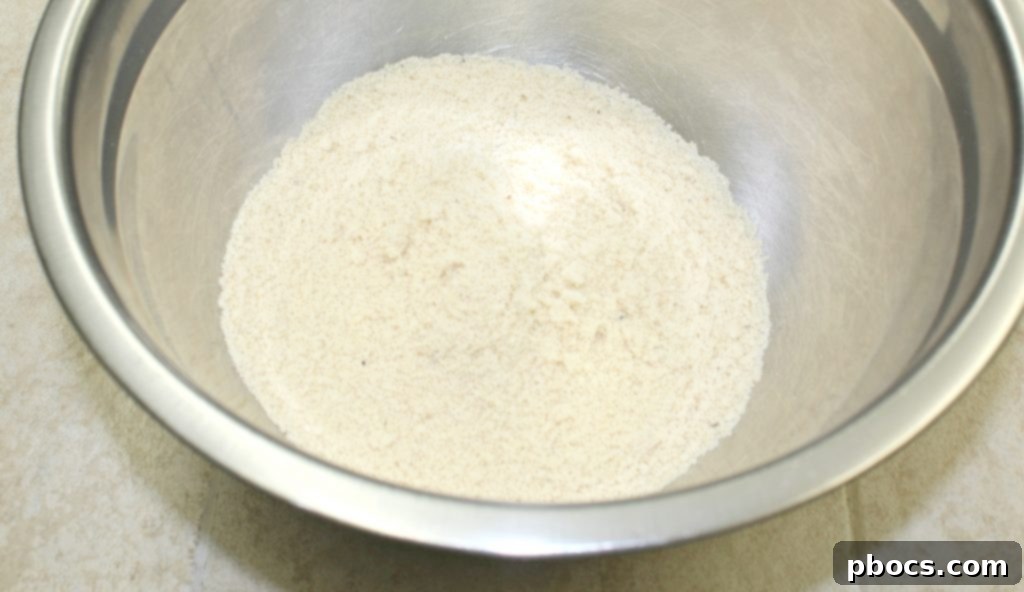 Mixing ingredients for a keto cheesecake crust.