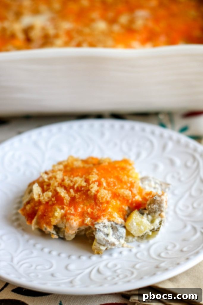 Low Carb Cheesy Squash Casserole with vibrant yellow and green squash