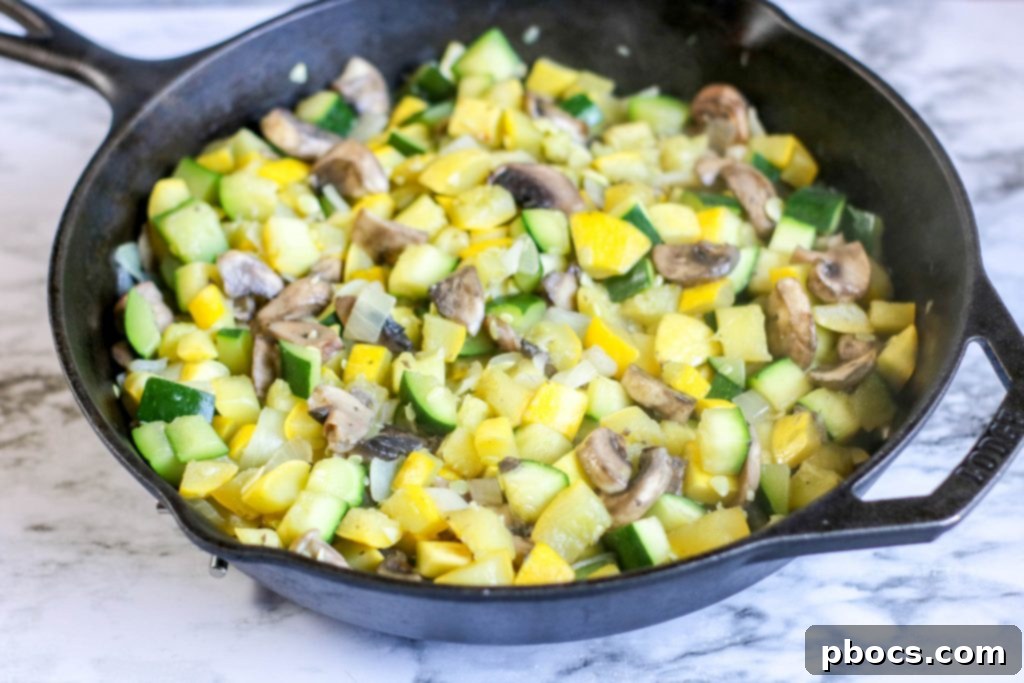 Sautéing vegetables for Low Carb Cheesy Squash Casserole