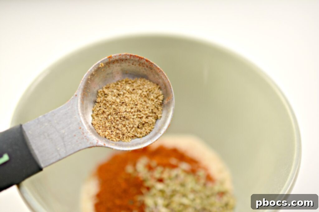 Sizzling Keto Steak Fajita Lettuce Wraps 7 Sautéing bell peppers and onions in a skillet for Keto Steak Fajitas.