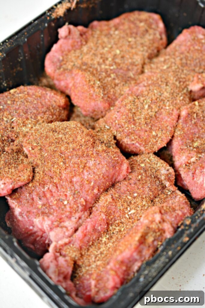Sizzling Keto Steak Fajita Lettuce Wraps 8 Seasoning raw sirloin steak with homemade fajita spice rub.