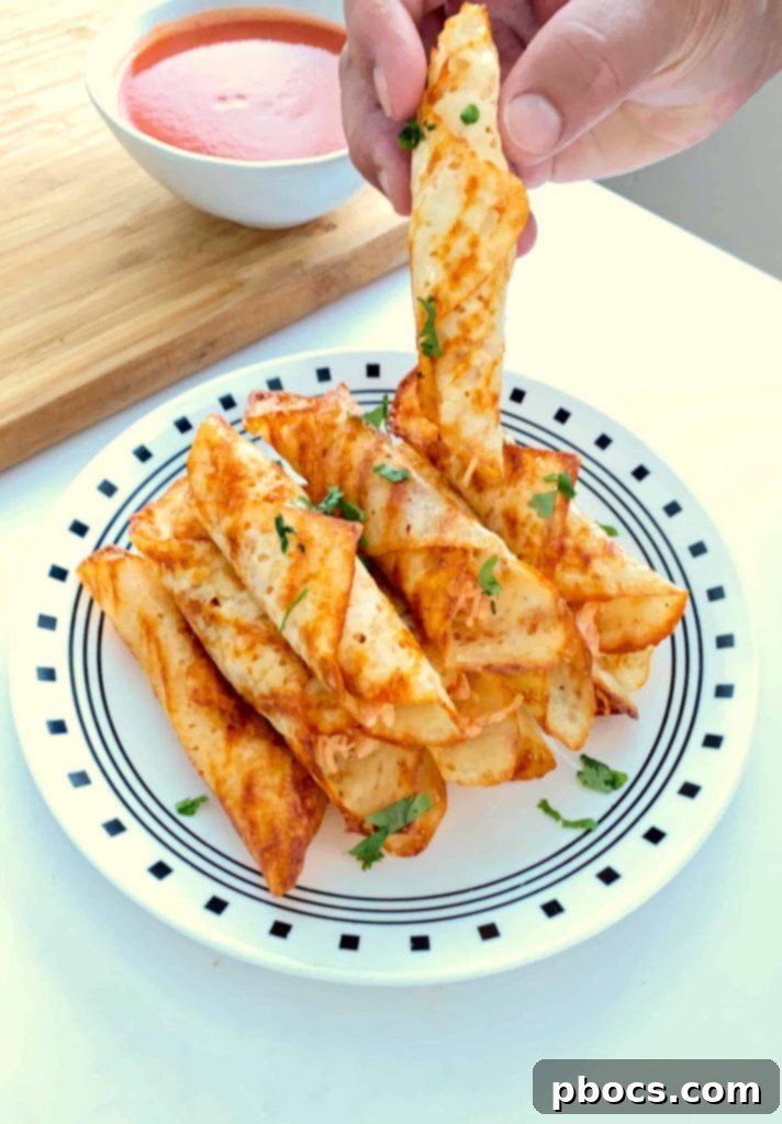 Crispy Keto Buffalo Chicken Taquitos 2 Crispy Keto Buffalo Chicken Taquitos ready to be served