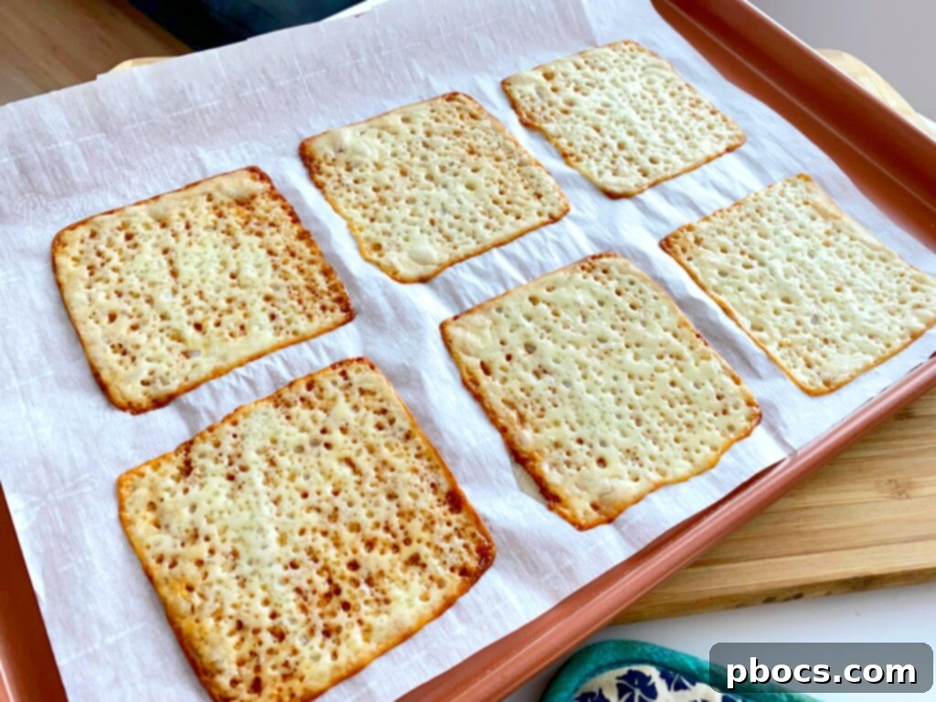 Crispy Keto Buffalo Chicken Taquitos 7 Baked mozzarella cheese slices with slightly browned edges