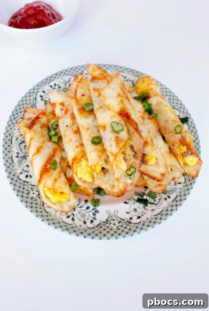 Savory Keto Breakfast Pinwheels 3 Close-up of freshly prepared Keto Breakfast Roll Ups on a plate