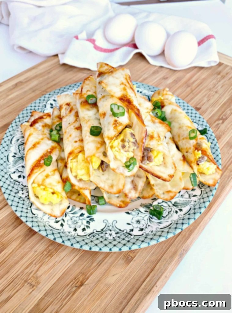 Savory Keto Breakfast Pinwheels 5 Ready-to-eat Keto Breakfast Roll Ups on a plate, garnished