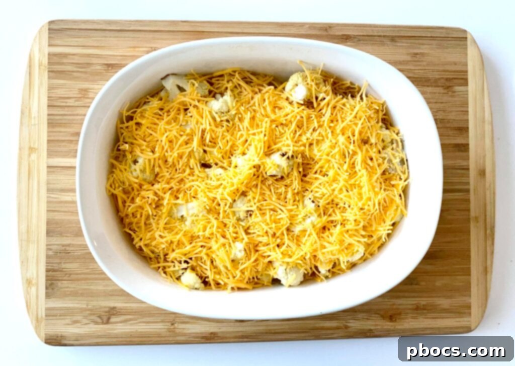 Keto Cheeseburger Cauliflower Bake 8 Browned ground beef seasoned with salt and pepper in a skillet