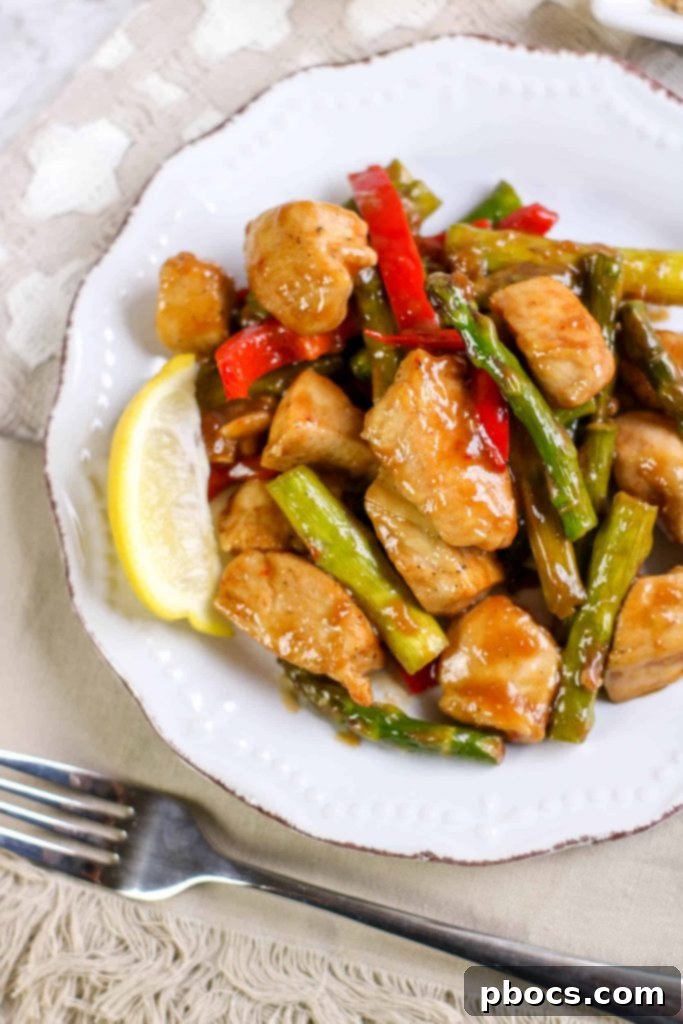 Effortless Low Carb Chicken Asparagus Stir-Fry 2 Delicious Low Carb Chicken Asparagus Stir Fry prepared in a skillet