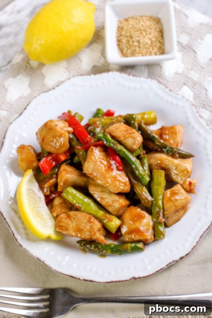Effortless Low Carb Chicken Asparagus Stir-Fry 3 Close-up of Low Carb Chicken Asparagus Stir Fry with toppings