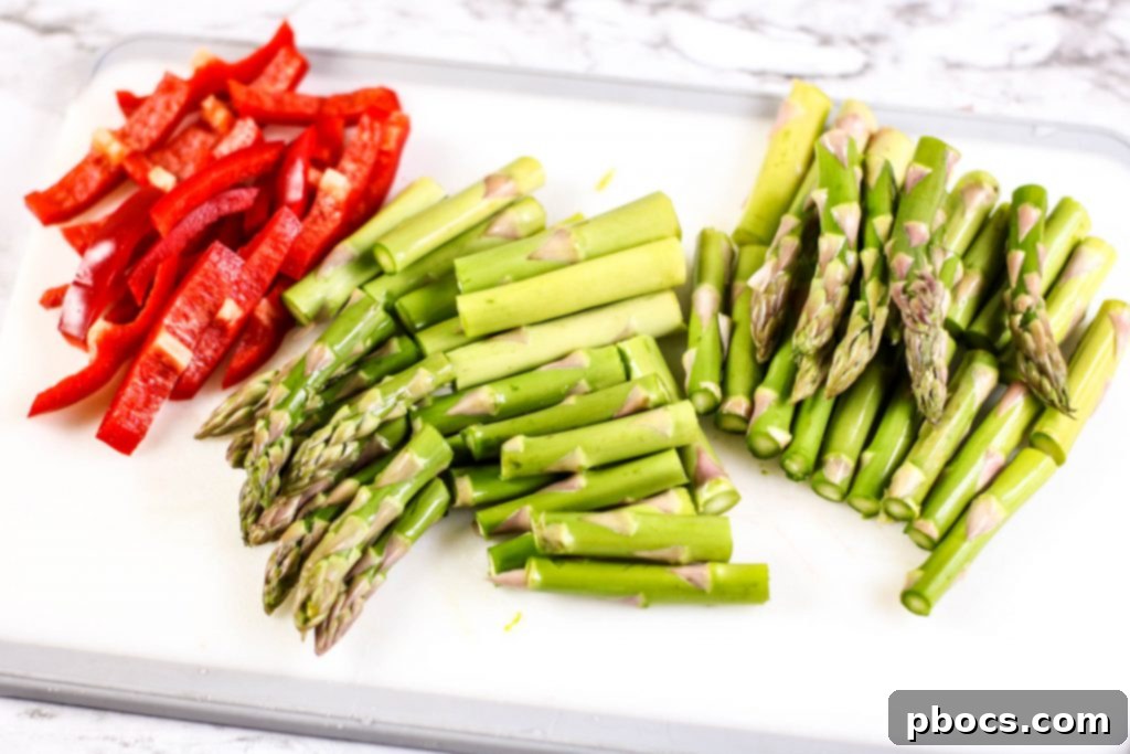 Effortless Low Carb Chicken Asparagus Stir-Fry 5 Cooking Low Carb Chicken Asparagus Stir Fry in a large skillet