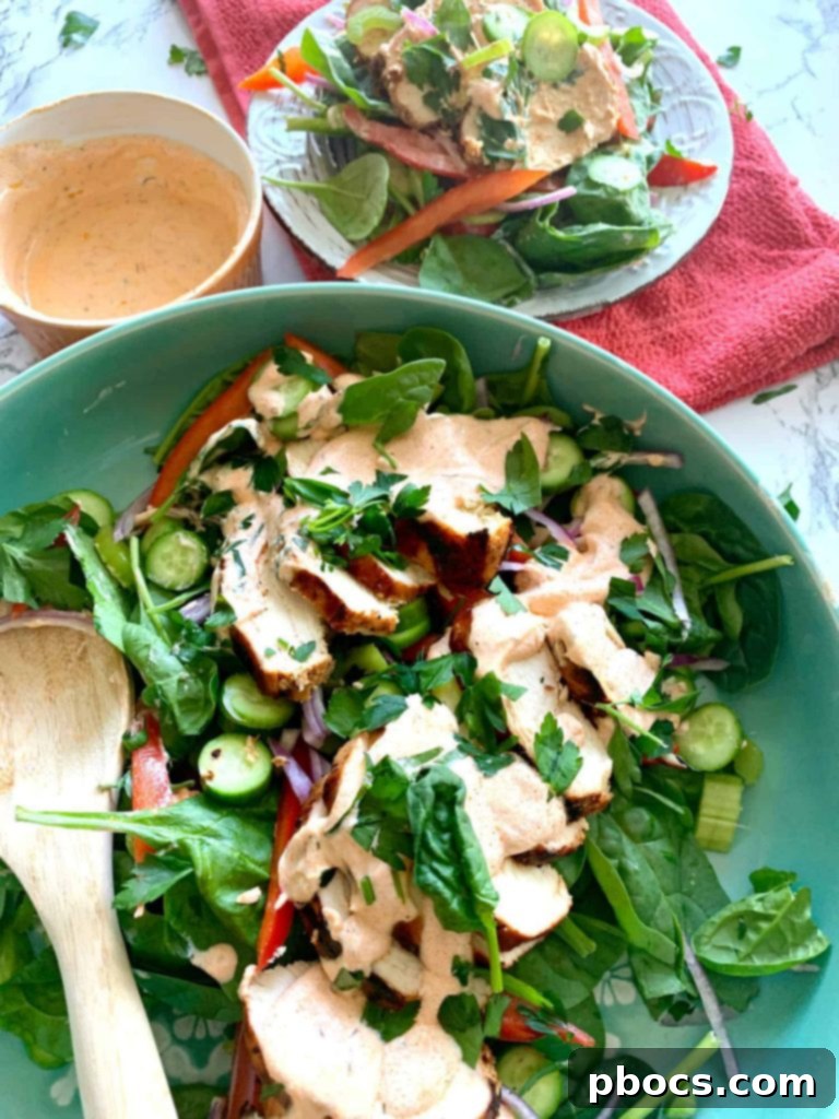 Low Carb Buffalo Chicken Salad Recipe, featuring a vibrant, fresh salad topped with grilled buffalo chicken and a creamy dressing.