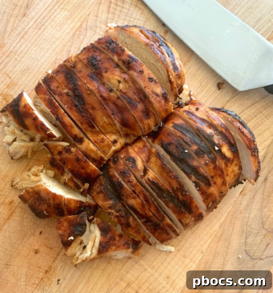 Sliced grilled buffalo chicken, a key component for the low carb salad.