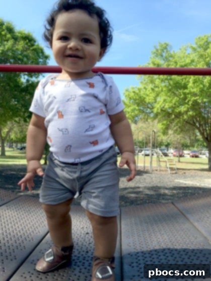 Toddler running on the beach