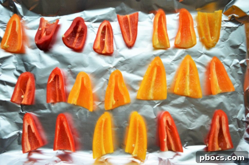 Cheesy Keto Tuna Poppers 8 Prepared bell pepper halves for stuffing.