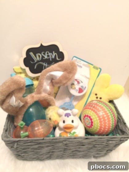 Josephs First Easter Surprise 3 A close-up of the personalized chalkboard stake with Joseph's name written in vibrant chalk ink, nestled within the Easter basket