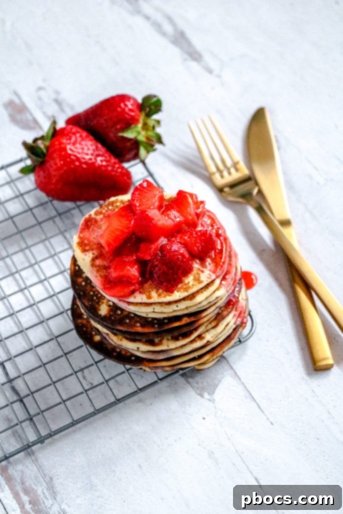 Fluffy Keto Strawberry Pancakes with homemade sauce